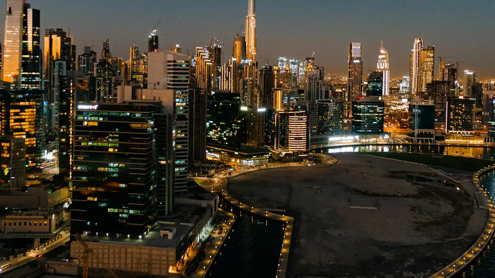Business Bay towers in Dubai at night, home to many companies preparing for UAE e-invoicing